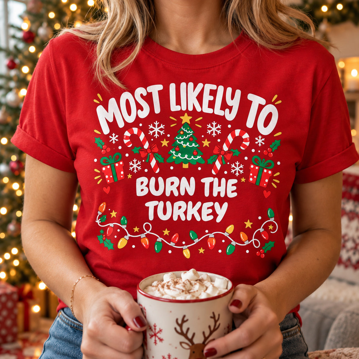 Red personalised Most Likely To Burn The Turkey Christmas doodle T-shirt worn with a hot chocolate