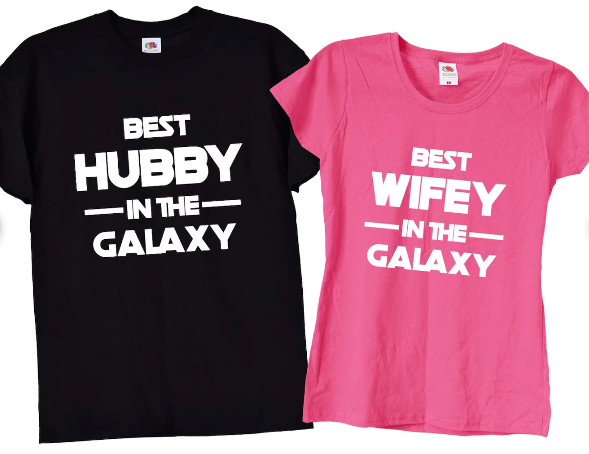 Our Star Wars-themed couples T-shirts are the perfect way to celebrate your love with a galactic twist! Featuring the fun slogans "Best Hubby in the Galaxy" and "Best Wifey in the Galaxy," these matching t-shirts are ideal for couples who want to show off their fandom in style. Made from soft, high-quality cotton, these tees offer all-day comfort and durability, perfect for everyday wear, date nights, or as a unique wedding or anniversary gift. Whether you're at a Star Wars event or just want to match in a 