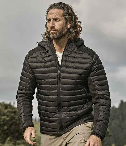 Tee Jays Crossover Hooded Padded Outdoor Jacket | Black/Black Melange