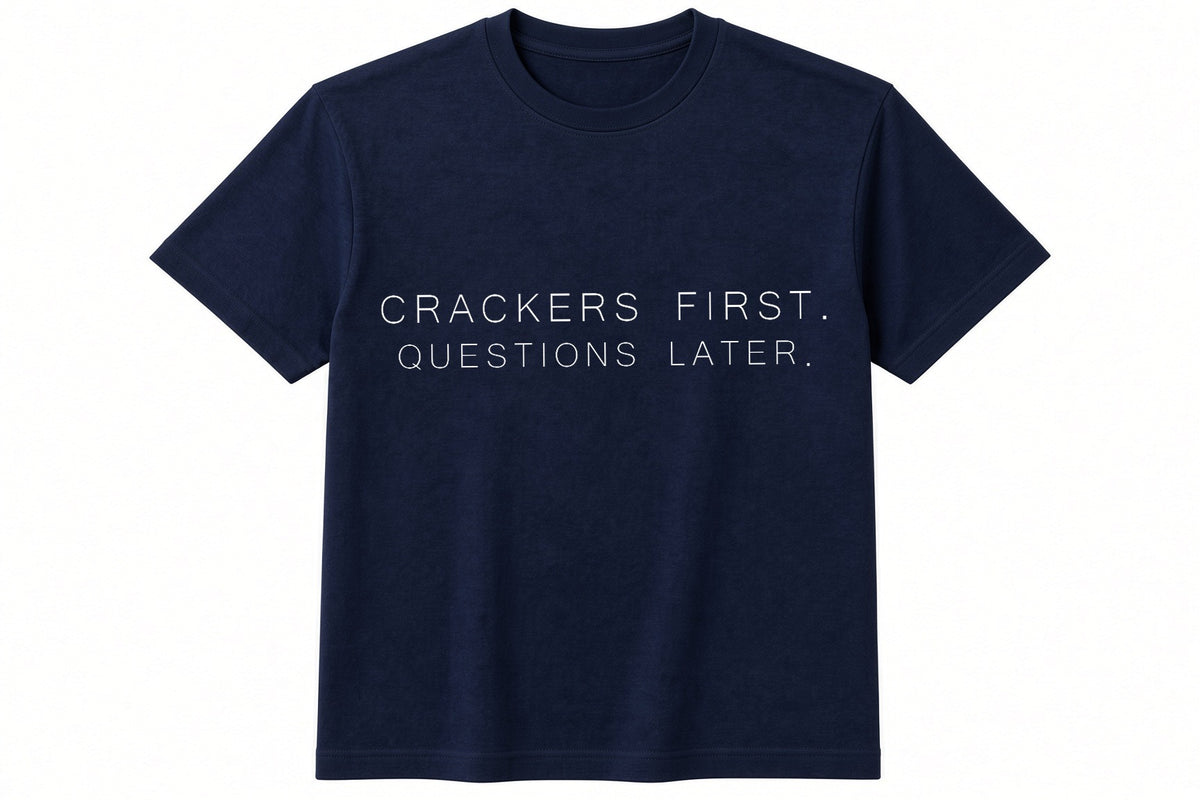 Crackers First. Questions Later. funny Christmas design on navy t-shirt