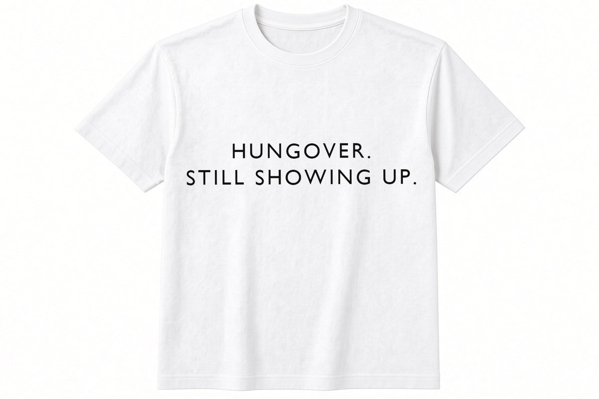 Hungover. Still Showing Up. funny football design on white t-shirt flat
