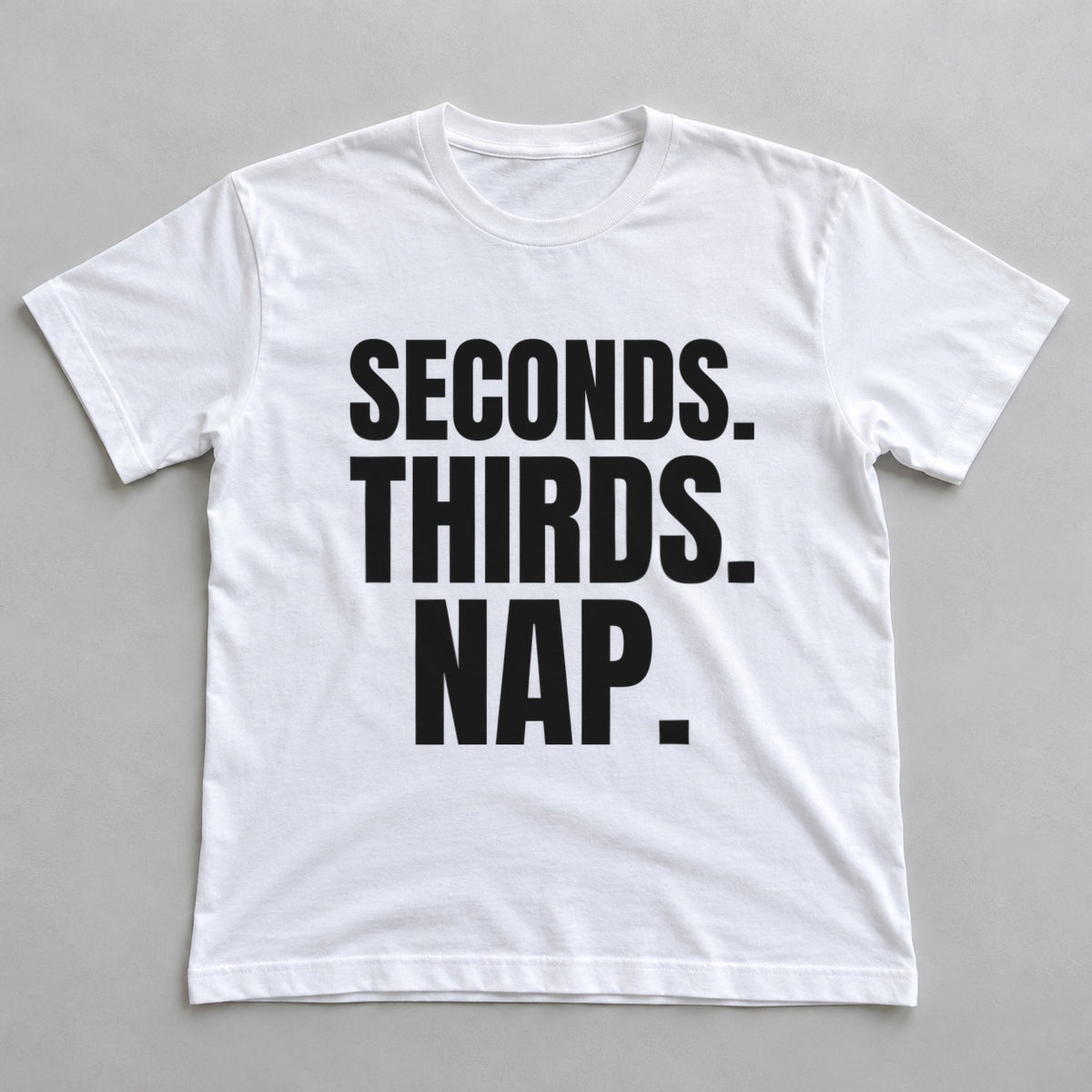 Seconds. Thirds. Nap. white t-shirt flat lay