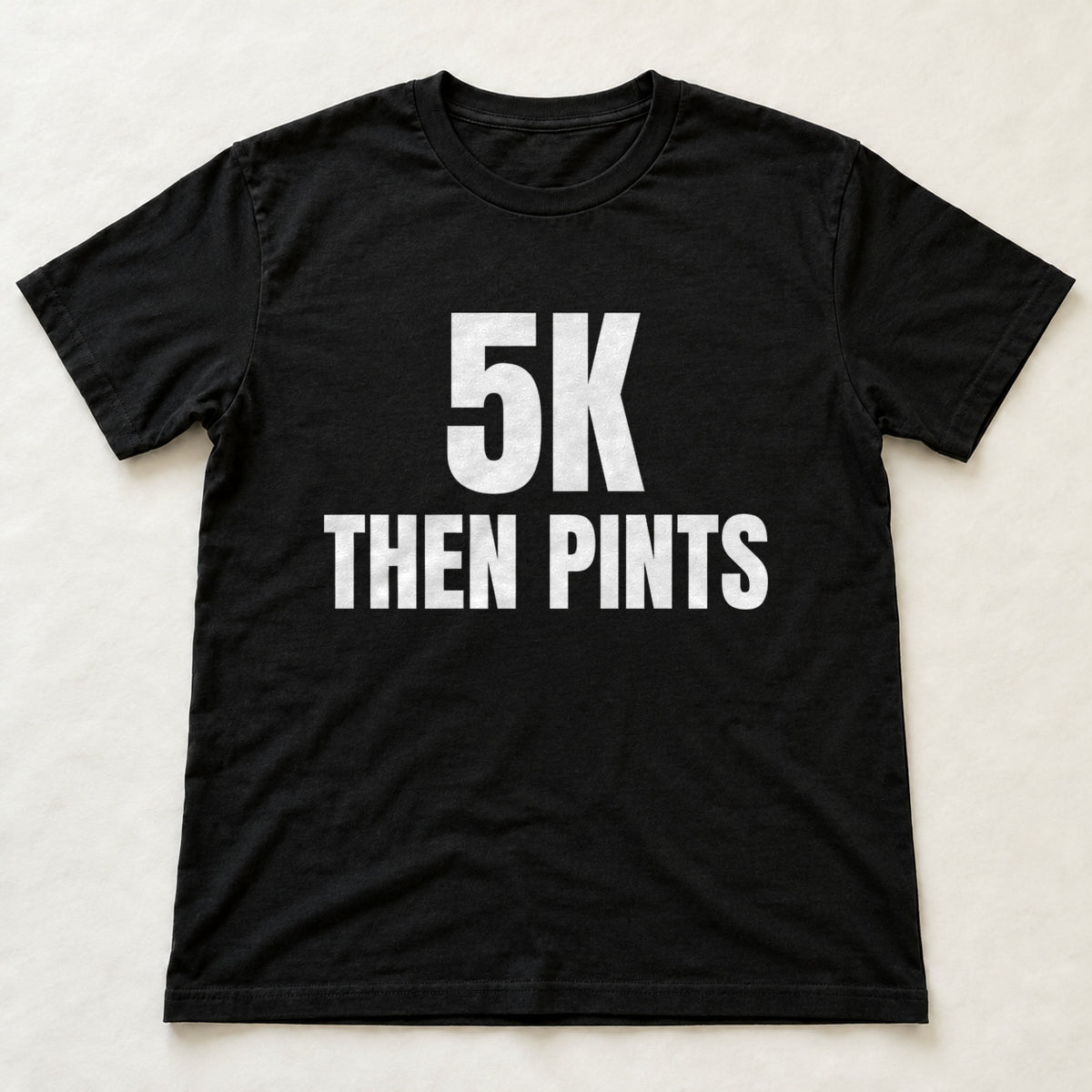 5K Then Pints black t-shirt flat lay