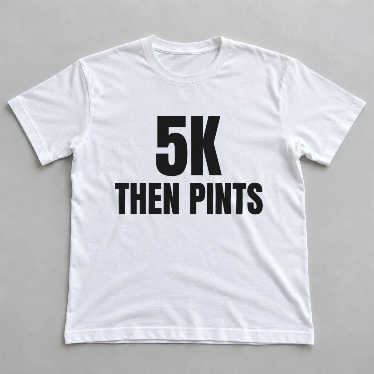 5K Then Pints white t-shirt flat lay