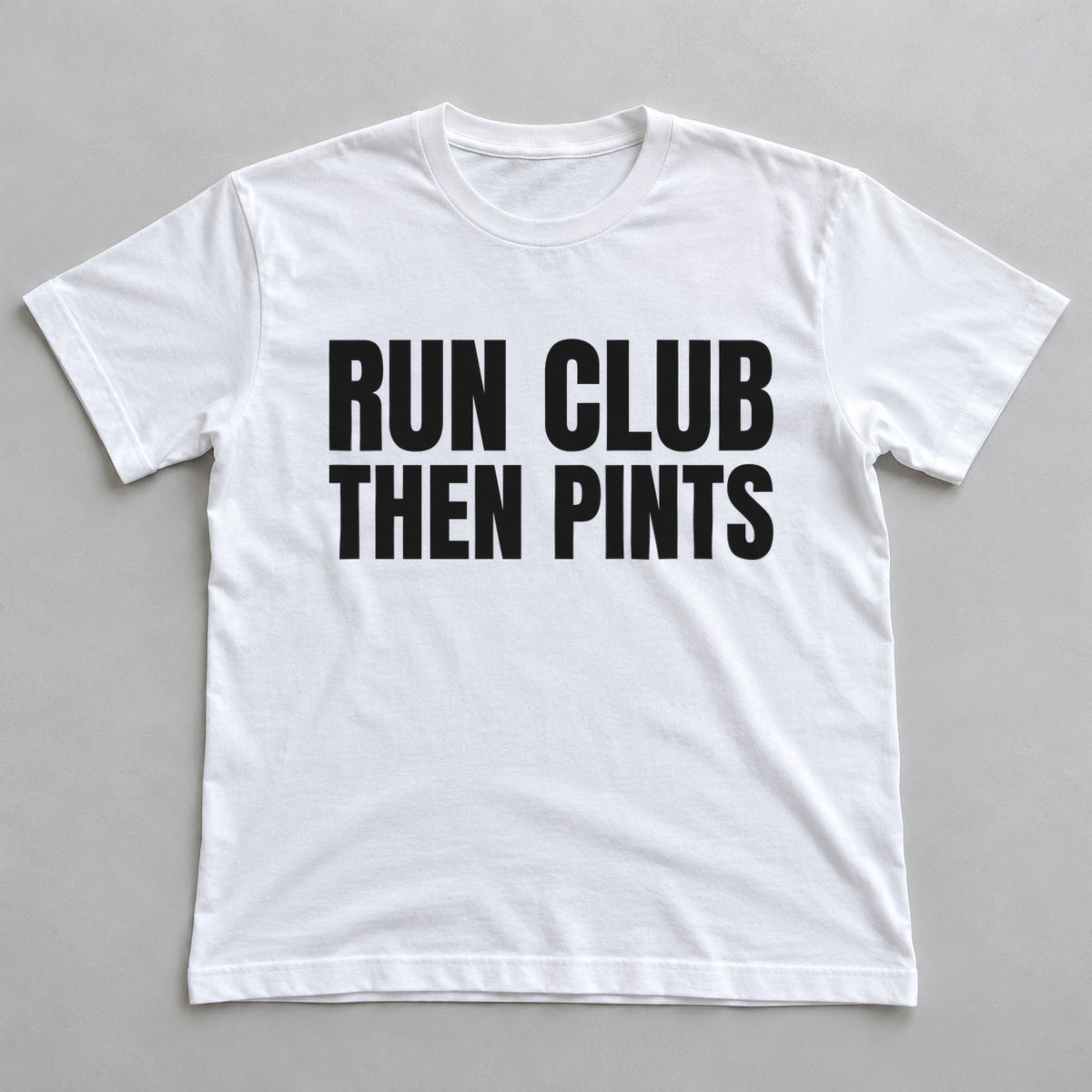 Run Club Then Pints white t-shirt flat lay