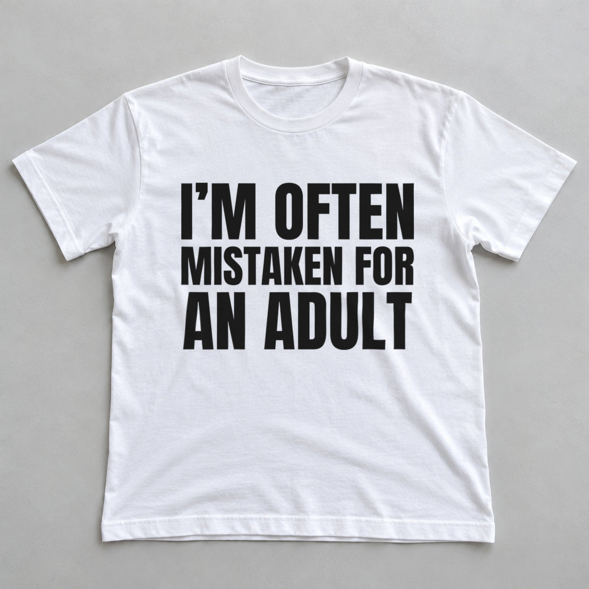 I'm Often Mistaken For An Adult white t-shirt flat lay