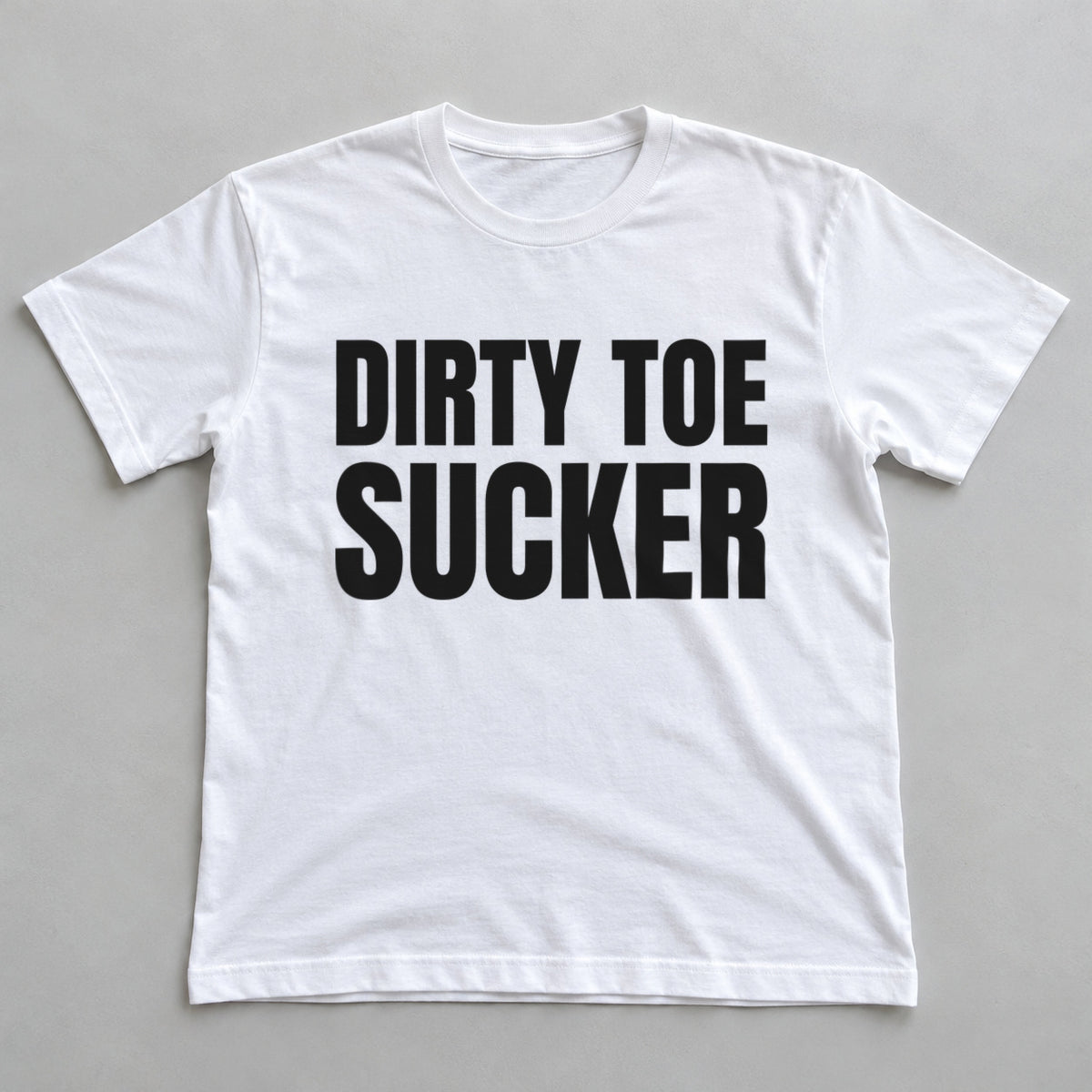 Dirty Toe Sucker white t-shirt flat lay